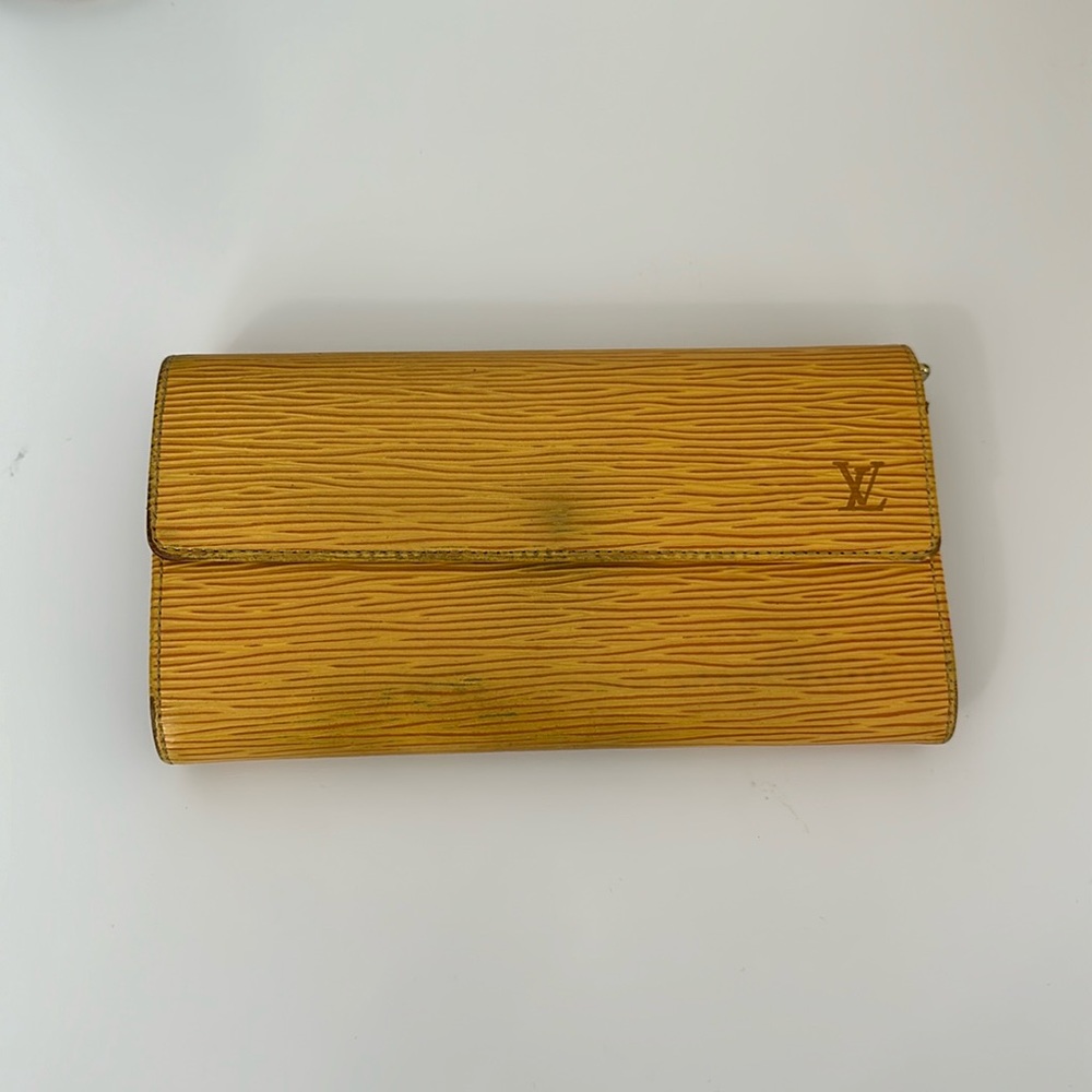Authentic LOUIS VUITTON Epi Porte Tresor International Snap Wallet in Yellow